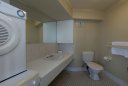 1 Bedroom Budget Apartments Bathroom & Laundry - 905